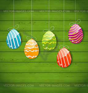 Easter colorful eggs on wooden texture - vector image