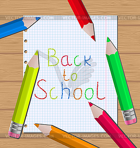 Back to school message with pencils on paper sheet - vector clipart