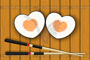 Heart-shaped sushi and chopsticks - vector image