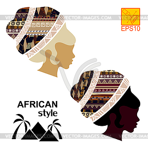 Silhouettes of head of an black African girls - vector clipart