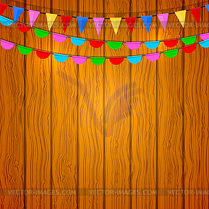 Festive flags on wooden background.  - vector clipart