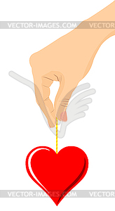 Heart in hand - vector image