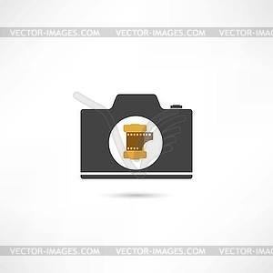 Black camera - vector clipart