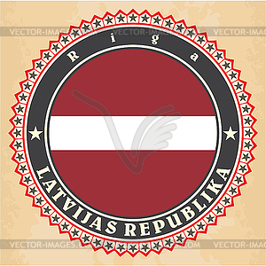 Vintage label cards of Latvia flag - vector image