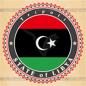 Vintage label cards of Libya flag - vector clipart