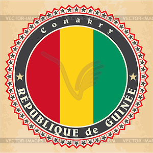 Vintage label cards of Guinea flag - stock vector clipart