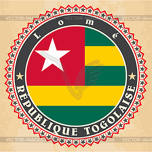 Vintage label cards of Togo flag - vector clip art