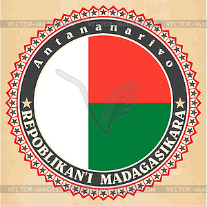 Vintage label cards of Madagascar flag - stock vector clipart