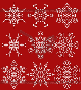 Set of drawn snowflake silhouettes - vector clip art