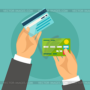 Hands holding bank cards in flat design style - vector clipart