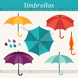 Set of cute multicolor umbrellas in flat design - stock vector clipart
