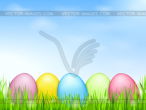 Colored Eggs in Grass - vector clipart