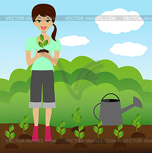 Young woman plants nursery transplant in soil - vector image