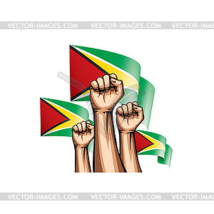 Guyana flag and hand - vector clip art