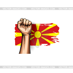 Macedonia flag and hand - royalty-free vector image