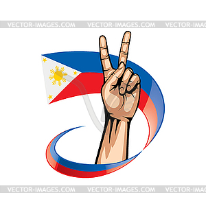 Philippines flag and hand - vector clipart