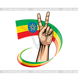 Ethiopia flag and hand - vector clipart