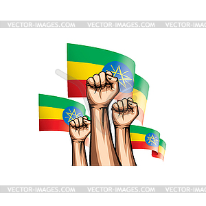 Ethiopia flag and hand - vector clipart