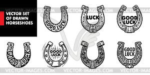 Painted horseshoe mascot - vector clip art