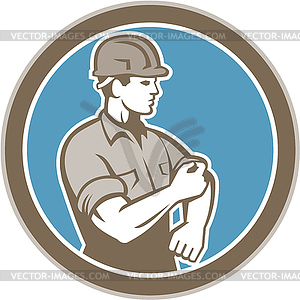 Construction Worker Rolling Up Sleeve Circle Retro - vector clipart