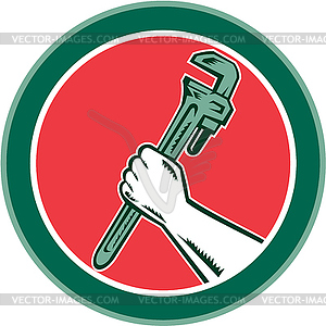 Hand Holding Adjustable Wrench Circle Woodcut - vector image