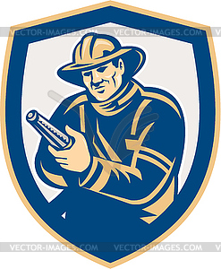 Fireman Firefighter Aiming Fire Hose Shield Retro - vector EPS clipart