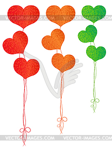 Colorful balloons in shape of hearts - vector image