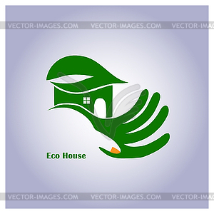 Green eco house in hand - vector clip art