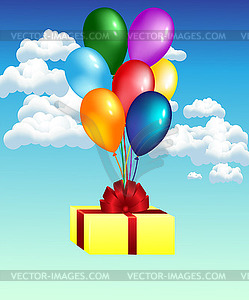 Balloons with gift - vector clip art