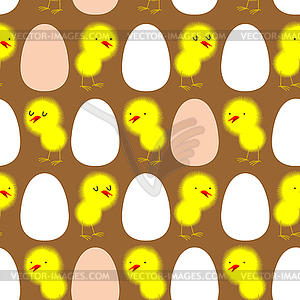 Yellow chickens and white eggs. seamless pattern - vector image