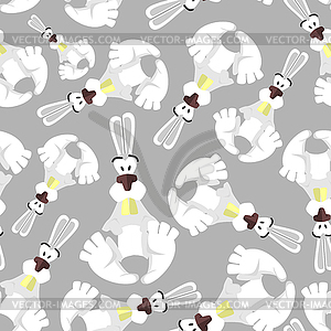 Seamless pattern with bunnies. Background of - vector image