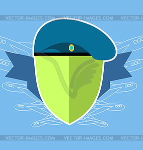 Military emblem . Shield with aircraft. Blue beret - vector image