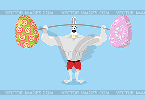 Strong rabbit holding barbell and Easter eggs. - vector image