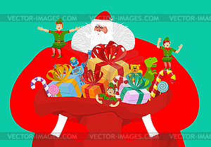 Santa with big bag of gifts. Red sack with toys - vector image