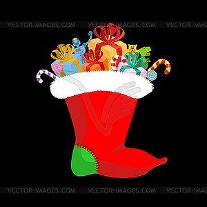 Christmas stocking with gifts. Sweets and toys for - vector clipart