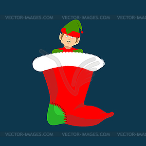 Christmas stocking and Santa Elf. Little Claus - vector clip art