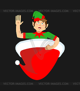 Santa cap and elf. Little Claus assistant. Christma - vector clipart