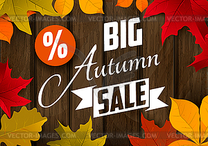 Big autumn sale. Autumn leaves on dark wooden - vector image