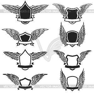 Set of empty emblems with wings. Design elements fo - white & black vector clipart