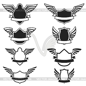 Set of empty emblems with wings. Design elements fo - vector clipart