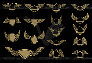 Set of winged emblems in golden style. Design - vector image