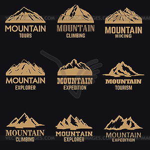 Set of mountain icons in golden style on dark - vector clipart