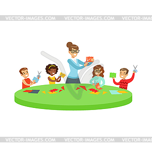 Four Children In Art Class Doing Applique Cartoon - vector EPS clipart