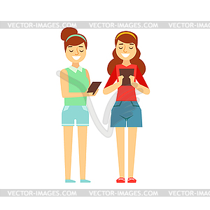 Two Girls Tooking At Their Tablets Standing, - vector clipart