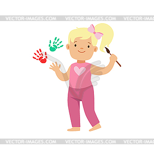Happy smiling little blond girl painting white - vector clipart