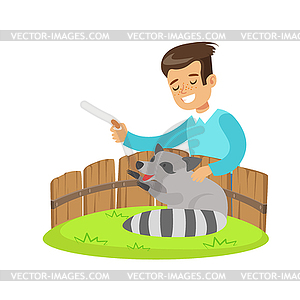 Smiling little boy petting and feeding raccoon in - vector clipart