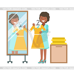 Женщина пытается на желтом платье в раздевалке, - изображение в векторе / векторный клипарт