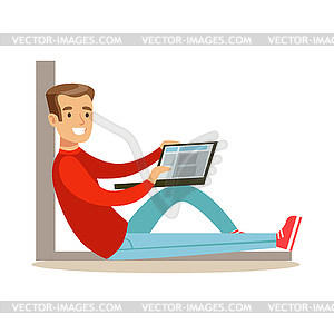 Young man sitting on floor with his laptop, colorfu - vector image