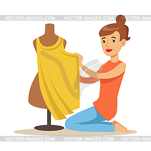 Young woman tailor sitting on floor and sewing dres - vector clipart