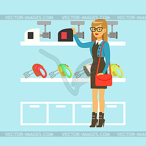 Young blond woman choosing meat grinder in home - vector clipart